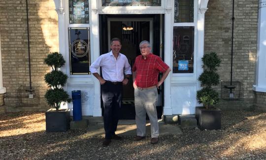 Jonathan Djanogly meets with proprietor Bill Sinclair at the reopened Rajpoot in Huntingdon.