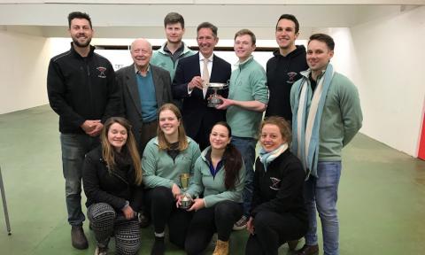 Jonathan presenting the Cambridge University team with their trophy for winning the Cambridge v Oxford shooting competition